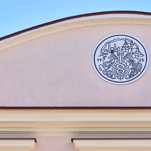 Estonian Chamber of Commerce and Industry emblem on a building facade